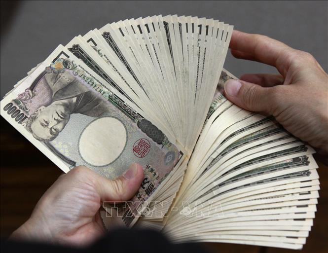 Đồng 10.000 yên Nhật Bản. Ảnh: AFP/TTXVN