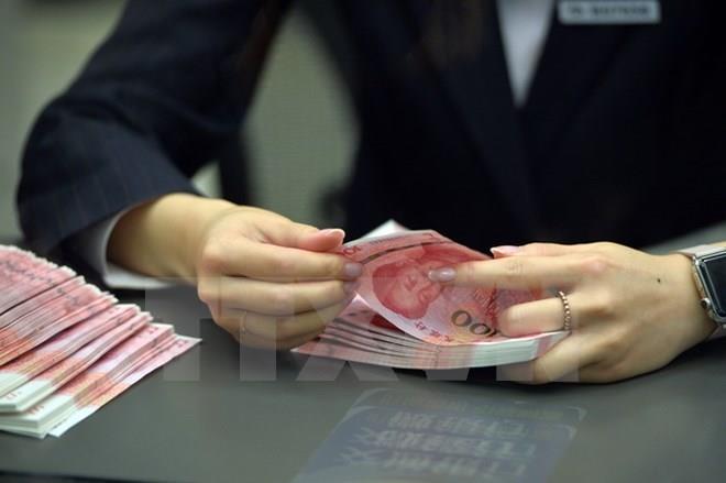 PBoC thông báo sẽ hạ tỷ lệ dự trữ bắt buộc của các ngân hàng. Ảnh: THX/TTXVN