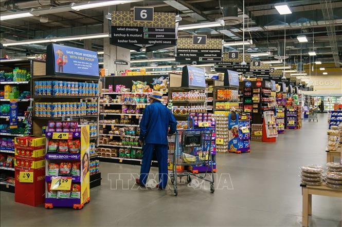 Người dân mua sắm tại một siêu thị ở Georgia, Mỹ. Ảnh: AFP/TTXVN