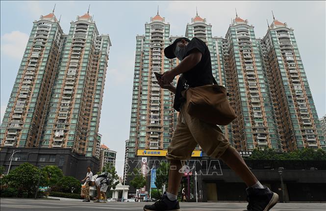  Chú thích ảnh Các tòa nhà do tập đoàn bất động sản Evergrande xây dựng tại Quảng Đông, Trung Quốc, ngày 17/9/2021. Ảnh tư liệu: AFP/TTXVN