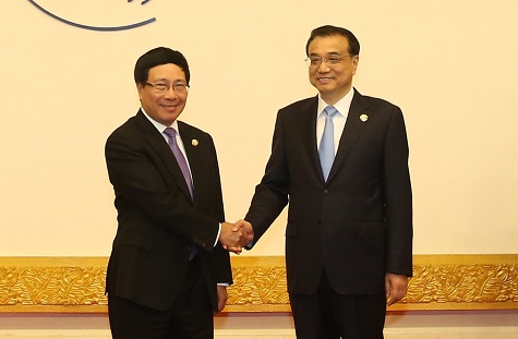 Phó Thủ tướng Phạm  Bình Minh và Thủ tướng Trung Quốc Lý Khắc Cường. Ảnh: VGP/Hải Minh