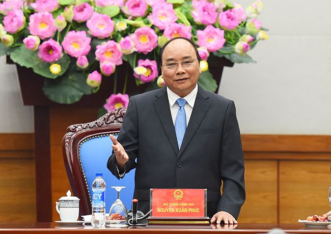Thủ tướng Nguyễn Xuân Phúc có cuộc gặp gỡ đoàn nhà báo tham dự Chương trình Nhà báo đồng hành cùng doanh nghiệp. Ảnh: VGP/Quang Hiếu
