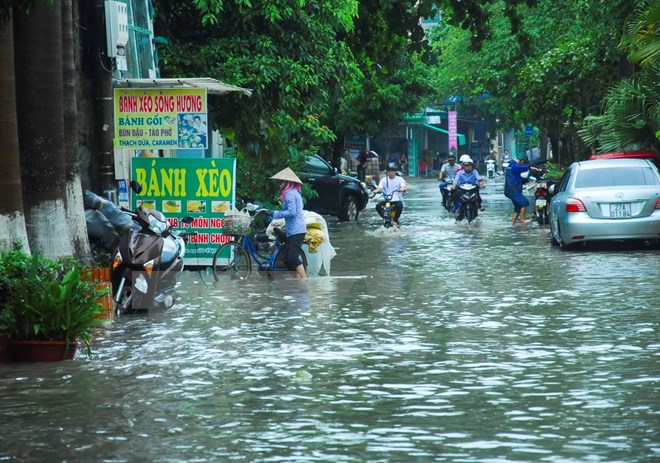Mưa lớn gây ngập lụt ở Điện Biên, ngày 2/7. Ảnh: Xuân Tư/TTXVN
