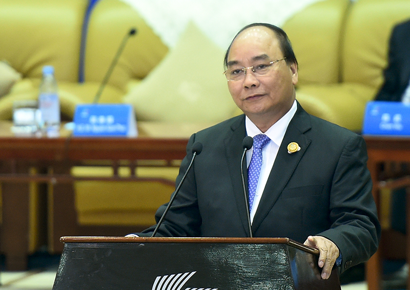 Thủ tướng Nguyễn Xuân Phúc đối thoại với lãnh đạo các doanh nghiệp hàng đầu Trung Quốc. Ảnh: VGP/Quang Hiếu