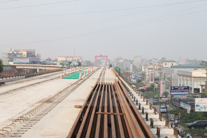 Phiến dầm cuối cùng trong tổng số 806 phiến của Dự án đường sắt đô thị Cát Linh-Hà Đông đã được hợp long. Ảnh: Doãn Đức/Vietnam+