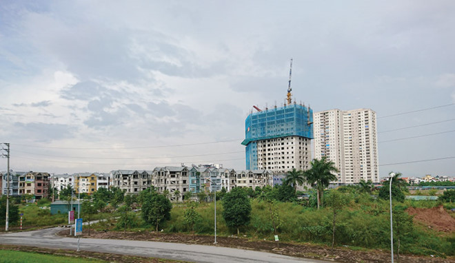 bất động sản Long Biên được dự báo sẽ được hưởng lợi trong thời gian tới với kế hoạch xây thêm cầu/hầm Trần Hưng Đạo và cầu Vĩnh Tuy giai đoạn 2. Ảnh: Dũng Minh