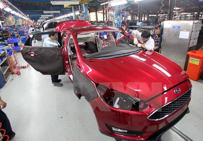 Sản xuất ôtô tại nhà máy ôtô Ford Hải Dương. (Ảnh: Trần Việt/TTXVN)