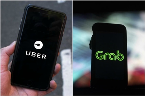  Uber và Grab đã đạt thỏa thuận mua bán và có thể công bố sáng mai. Ảnh: Scoopnest