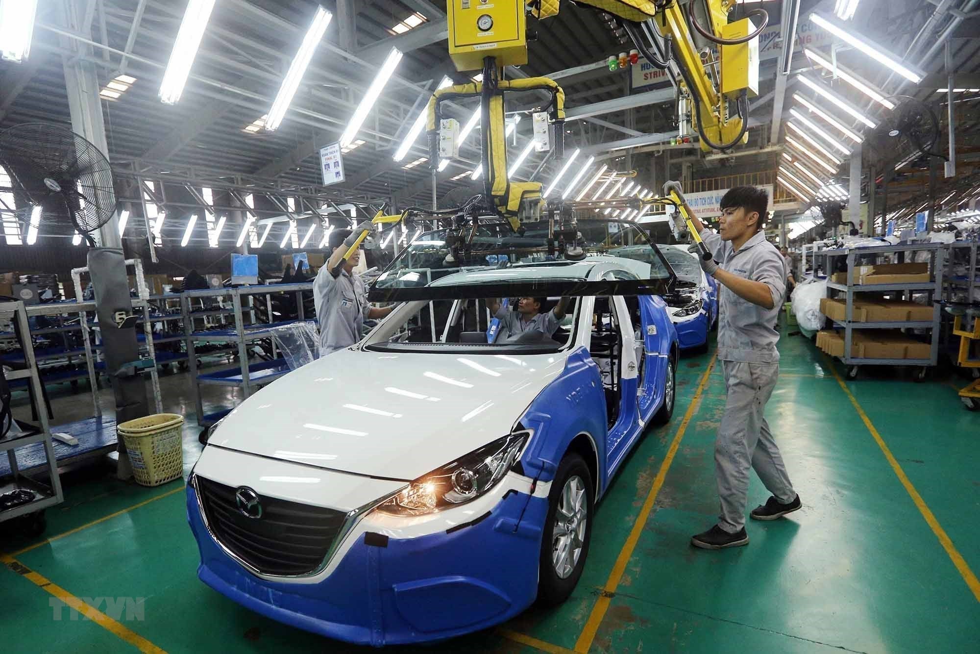  Dây chuyền lắp ráp xe Mazda của Công ty Cổ phần ôtô Trường Hải trong Khu kinh tế mở Chu Lai (Quảng Nam). (Ảnh: Danh Lam/TTXVN)