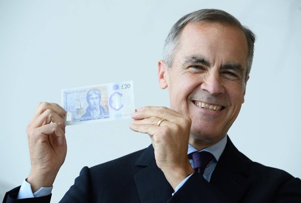 Thống đốc ngân hàng Anh quốc Mark Carney giới thiệu đồng 20 bảng Anh mới. Nguồn ảnh: Getty Images