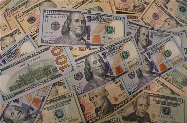 Đồng USD tại một ngân hàng ở Washington, DC. Ảnh: THX/TTXVN