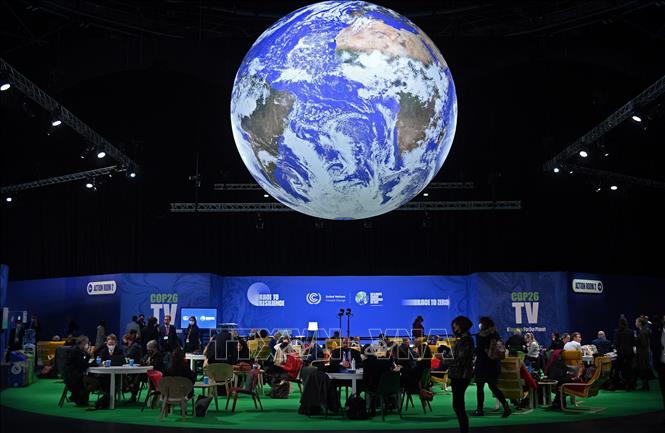 Đại biểu dự Hội nghị COP26 tại Glasgow, Scotland ngày 2/11/2021. Ảnh: AFP/TTXVN