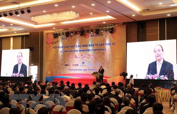 Thủ tướng Nguyễn Xuân Phúc phát biểu tại Hội nghị gặp mặt các nhà đầu tư lần thứ 10 tại tỉnh Nghệ An - tháng 3/2018. (Ảnh: Thống Nhất/TTXVN)