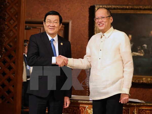 Tổng thống Philippines Benigno Aquino III hội đàm với Chủ tịch nước Trương Tấn Sang nhân dịp Hội nghị cấp cao APEC lần thứ 23. (Ảnh: Vietnam+)