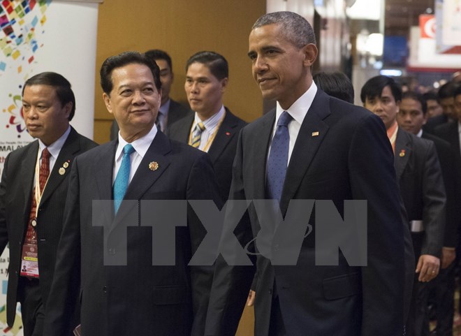 Thủ tướng Nguyễn Tấn Dũng (trái) và Tổng thống Mỹ Barack Obama (phải) tại Hội nghị Cấp cao ASEAN-Mỹ. (Nguồn: Vietnam+)