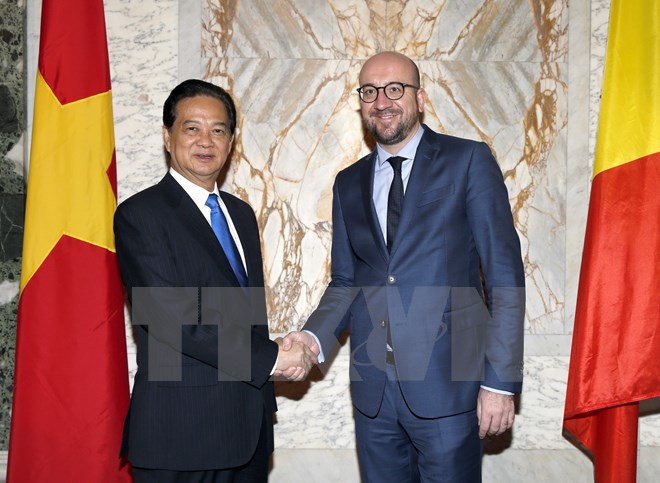 Thủ tướng Vương quốc Bỉ Charles Michel hội đàm với Thủ tướng Nguyễn Tấn Dũng. (Ảnh: Vietnam+)
