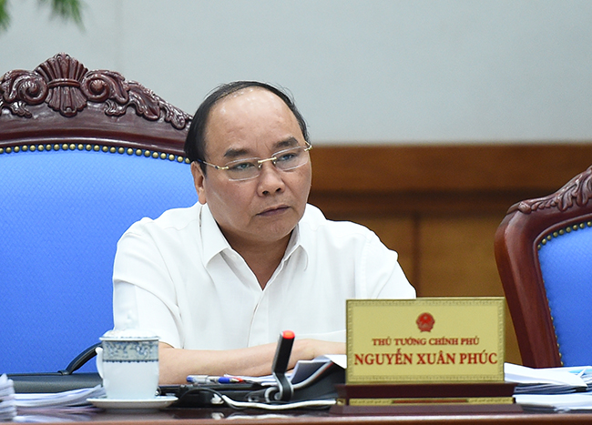 Thủ tướng Nguyễn Xuân Phúc chủ trì phiên họp Chính phủ thường kỳ tháng 7 (Ảnh: VGP/Quang Hiếu)